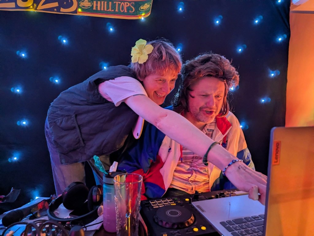 Picture of a man and woman, they are wearing fancy dress